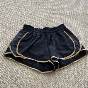 Lululemon Black & Gold Hotty Hot Short Size 6